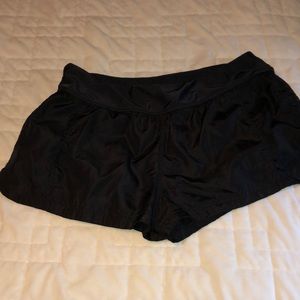Black lined swim shorts